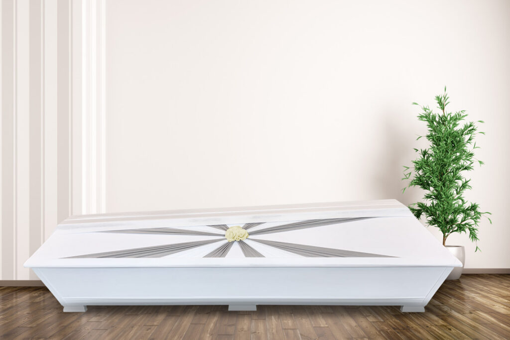 Coffin with a flower
